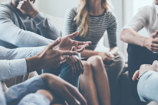 close up of hands in a group