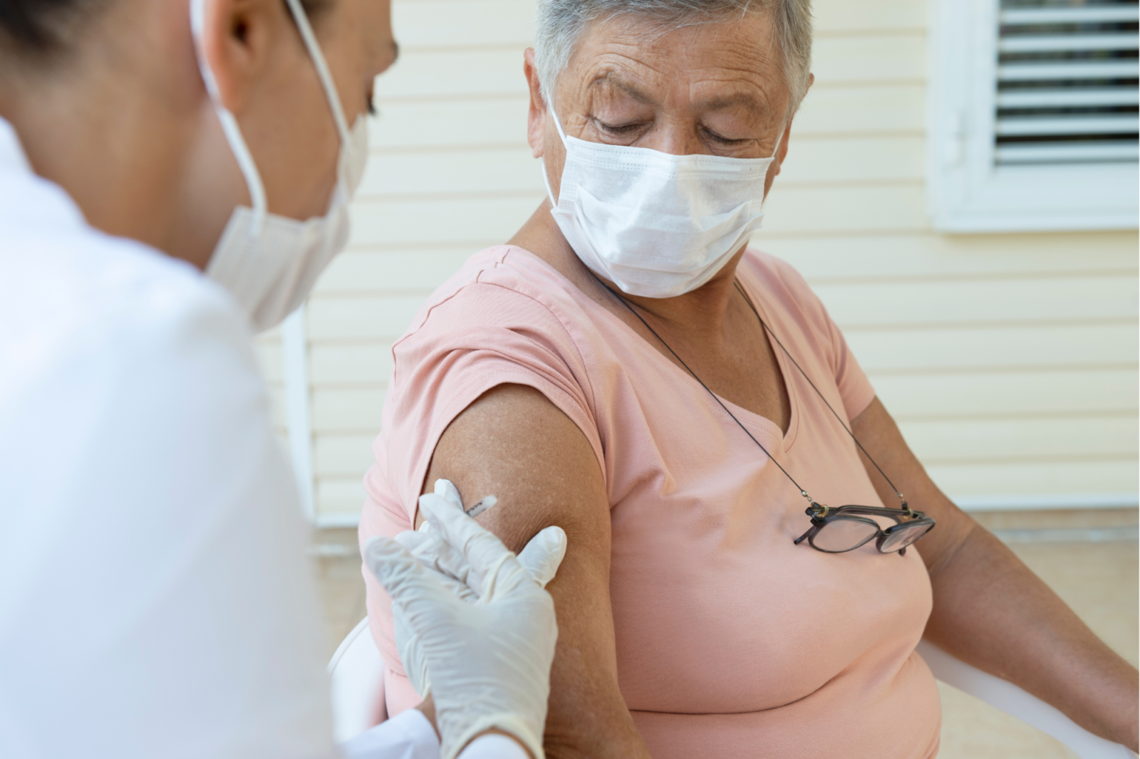 older woman getting vaccinated